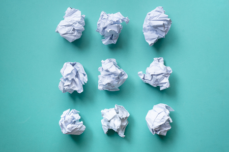 collection of various crumpled paper on green backgroundの写真素材