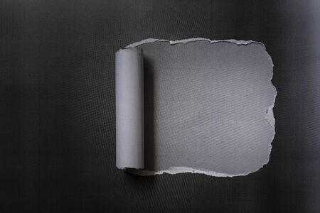 Hole ripped or torn paper photocopy texture and background, with copy spaceの写真素材