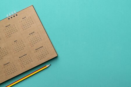 close up of calendar on the green table, planning for business meeting or travel planning conceptの写真素材