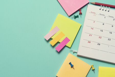 close up of calendar on the table, planning for business meeting or travel planning concept