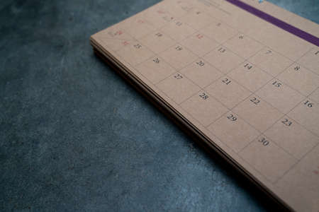 Close up of calendar on the black tableの写真素材