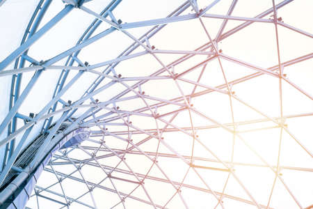 building construction of metal steel framework outdoors, architecture and construction site background conceptの写真素材