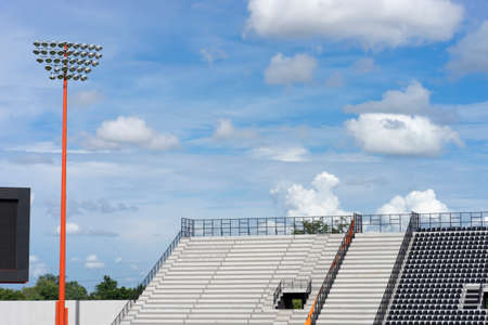 Seats and blue sky in an open air stadium, sport cpnceptの写真素材