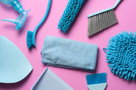 House cleaning product on the table with pink background, home service or housekeeping conceptの写真素材