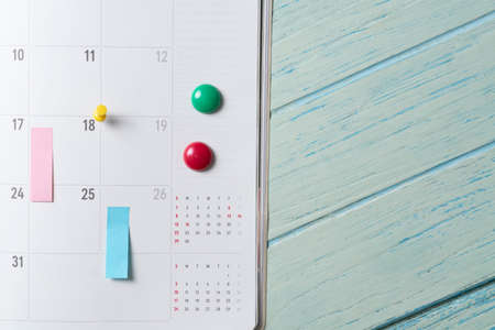 close up of calendar on the blue table