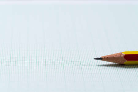 close up pencils on graph paper, research and education concept