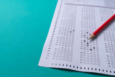 close up red pencil on answer sheets, education conceptの写真素材