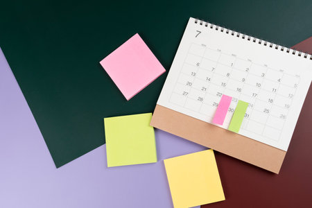 close up of calendar on the colorful table background, planning for business meeting or travel planning conceptの写真素材