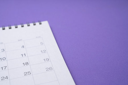 close up of calendar on the colorful table background, planning for business meeting or travel planning conceptの写真素材