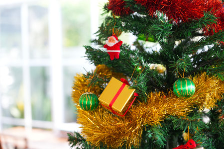 New Year or Christmas festival gift and tree background in the roomの写真素材