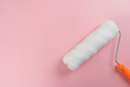 close up brush paint roller on the pink background house, diy and repair conceptの写真素材