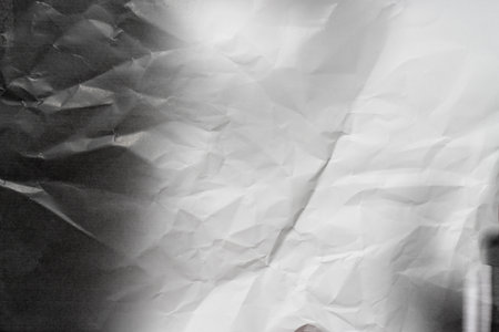 Photocopy black and white crumpled paper texture and background, close upの写真素材