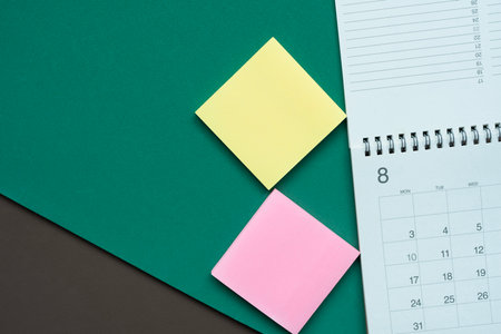close up of calendar on the green table background, planning for business meeting or travel planning...