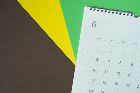 close up of calendar on the colorful  table background, planning for business meeting or travel planning conceptの写真素材