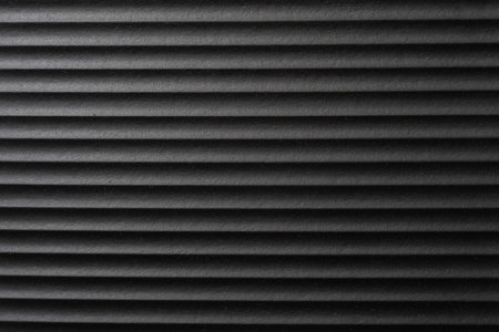 Black rough wavy texture background close up viewの写真素材