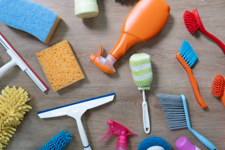 House cleaning plastic product on wood table background, home service or housekeeping conceptの写真素材