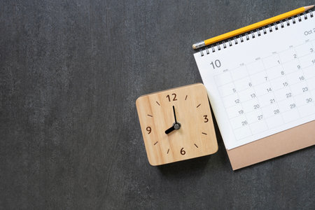 close up of calendar on the black table background, planning for business meeting or travel planning conceptの写真素材