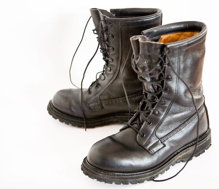 Dark brown leather military bootsの写真素材
