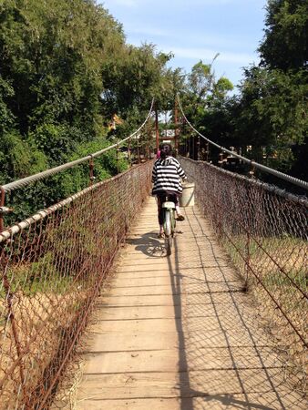 A local riding in Battambang, Cambodiaの素材