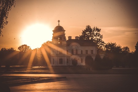 Chapel in winter at sunset evening lightの写真素材