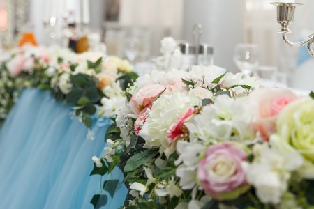 Flower wedding decoration with candles and angelの写真素材