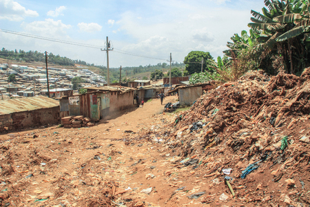 Kibera, Nairobi, Kenya - February 13, 2015: Huge heaps of burning garbage in the slums of Nairobi - one of the poorest places in Africaのeditorial素材