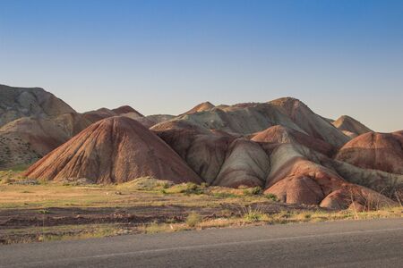 Stunning unusual colored mountains in Iran near Tabriz. Unusual geology with colorful sand in the...