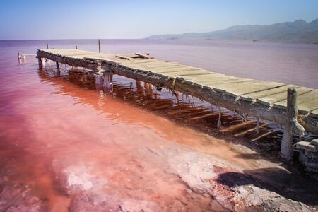 The unusual pink Lake Urmia, full of salt and a picturesque bridge