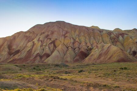 Stunning unusual colored mountains in Iran near Tabriz. Unusual geology with colorful sand in the hills. Natural attractions of Iran. Hiking in Iran.の写真素材
