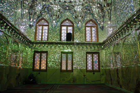 Shiraz, Iran - May 12, 2017: The magnificent beauty of the Shah-e-Cheragh Shrine mosque, decorated in green with numerous mirrors in Shiraz, Iranのeditorial素材