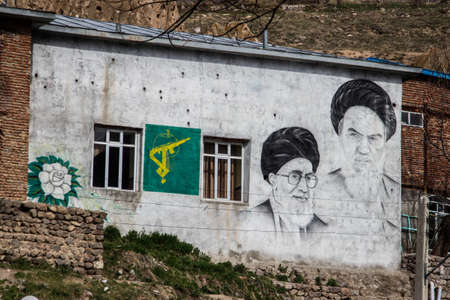 Tabriz, Kandovan, Iran - May 5, 2017: Portraits of the presidents of Iran on the wall. Khomeiniのeditorial素材