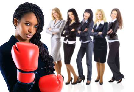 Young African American woman wearing boxing gloves の写真素材