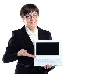 Mature business woman with laptop against white background with copy space