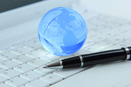 Globe on business documentsの写真素材