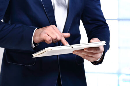 Business man working with a digital tablet
