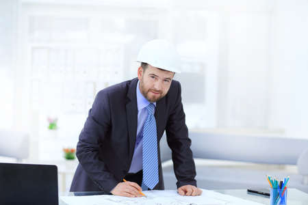 Architect designing house for client in office