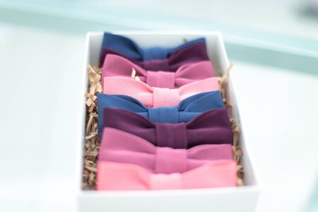 Different bow ties on glass table backgroundの写真素材