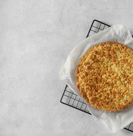 Appetizing apple pie on light background. top view, copy space