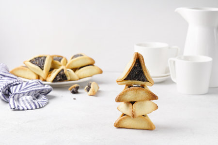 Traditional Hamantaschen cookies for the Jewish holiday lay in stackの写真素材