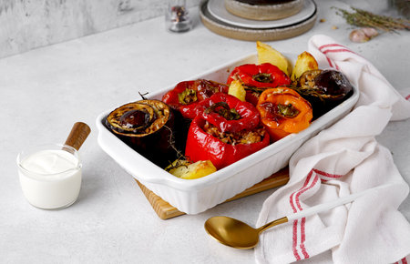 Greek traditional gemista, stuffed peppers with meat and rice in cooking dishの写真素材