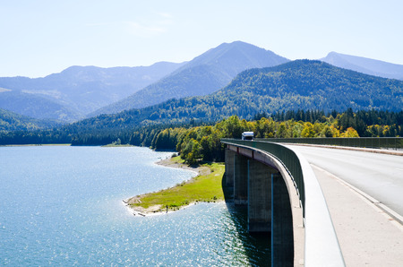 Bridge on Sylvenstein Reservoir in Autumn (Germany)の写真素材