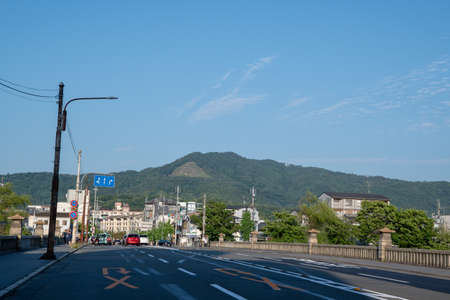 Mt. Daimonji from Kamo-Hashi Bridge in the Spring Evening, Kyoto, Japan
