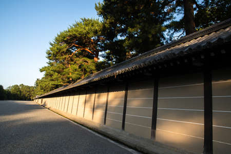 Roofed mud wall of Kyoto Imperial Palace in the spring evening, Kyoto, Japanのeditorial素材