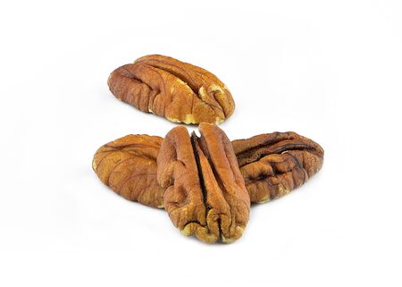 Pecan nuts isolated on white backgroundの写真素材