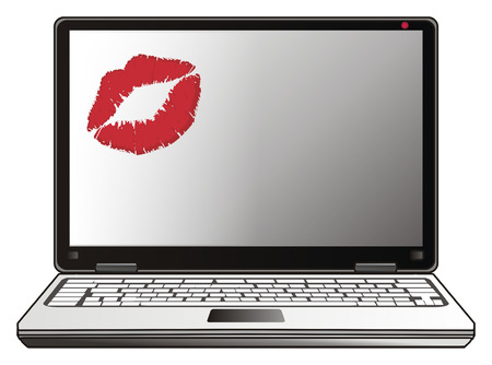 Red lipstick kiss of the laptopの写真素材