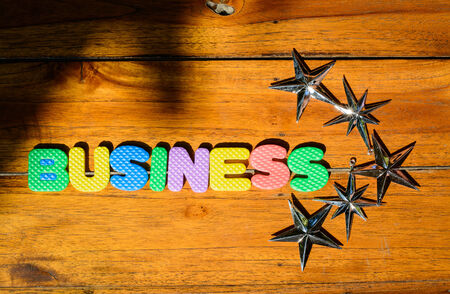 Business word in natural wood の写真素材