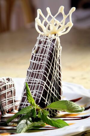 Chocolate sweet dessert with mint in restaurantの写真素材