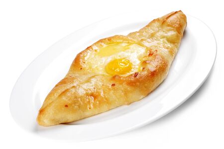 Georgian national food fried bread with egg and cheeseの写真素材