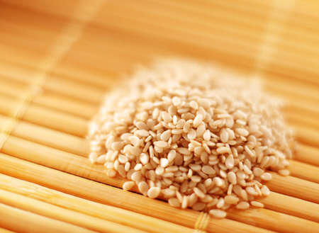 Sesame seed heap closeup on yellow napkinの写真素材
