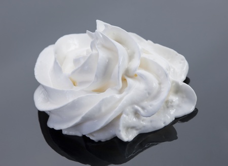 White milk cream froth closeup on darkの写真素材